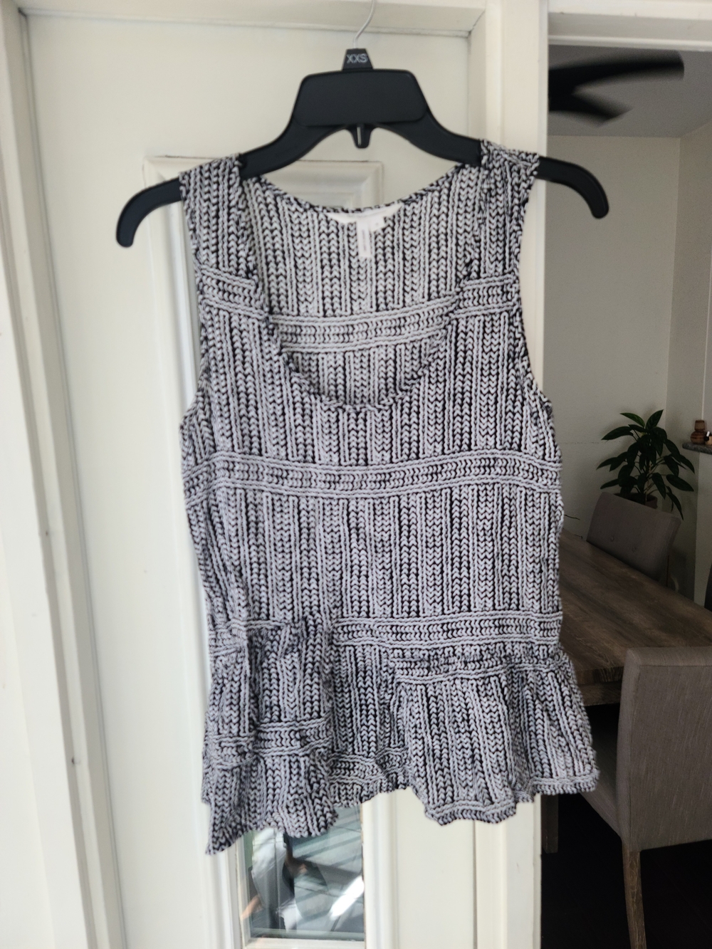 BCBGeneration Black and White Sleeveless Peplum Knit Top
